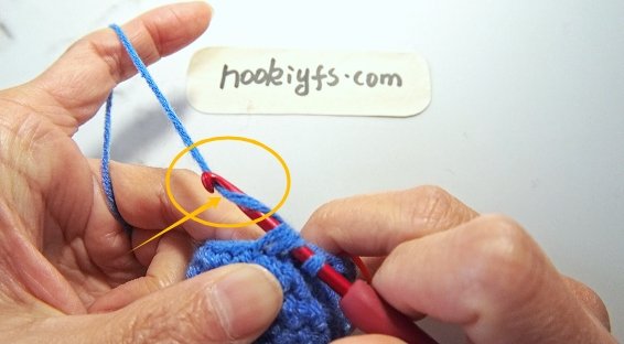 Yarn over and pull through both front loops.