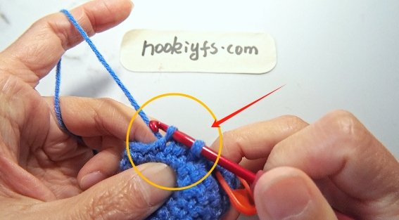 Yarn over again and pull through the remaining two loops.