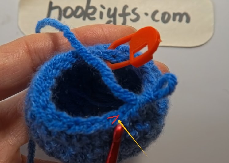 Finding the correct spot to insert the hook after a decrease can be tricky.