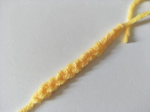 Tighten the yarn end on both sides