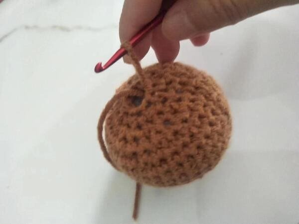 pull out the yarn end