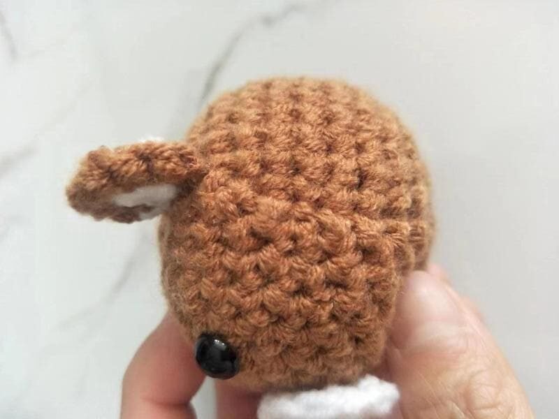 sewing ear on the slip stitch position