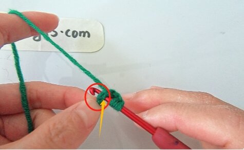 In that chain farthest from the hook insert the hook.