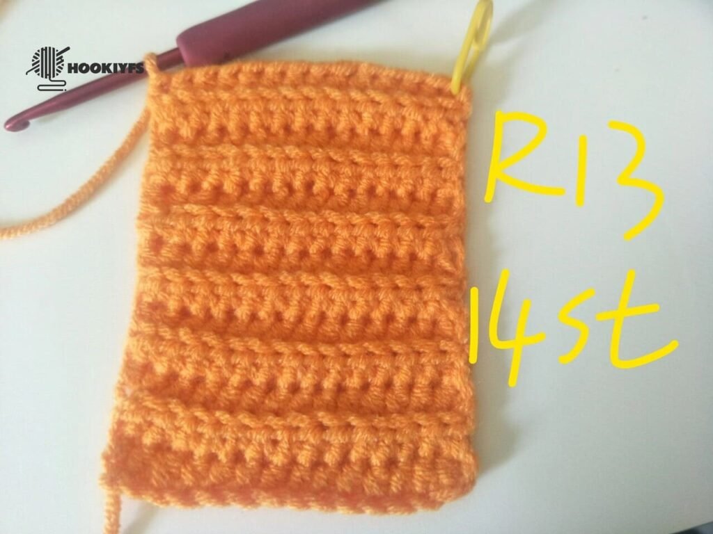 14 stitches is completed for round 13 for crochet pumpkin pattern