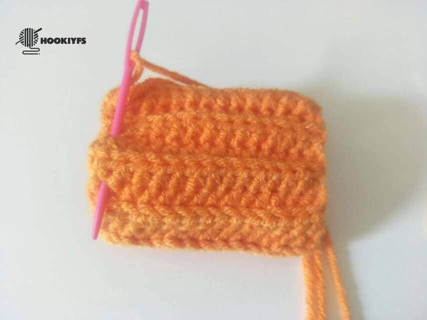 Start sewing the first of the one side for crochet pumpkin pattern