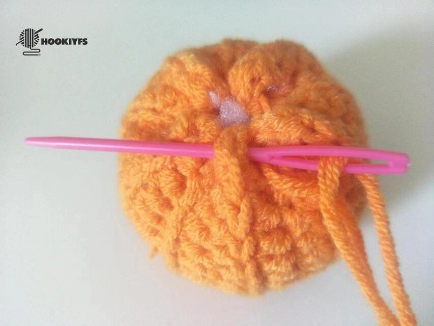 Start sewing the second of the another side for crochet pumpkin pattern