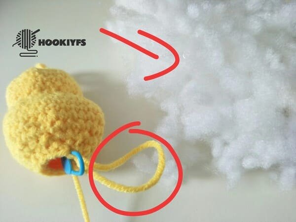 add fiberfill in to the hole of body for duck crochet