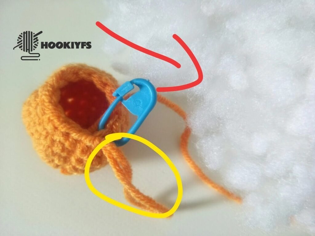 add the fiberfill to hole of body for persimmon crochet