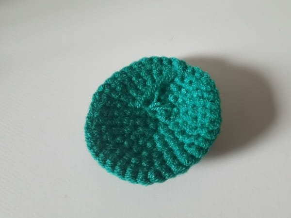 back of dark green fabric