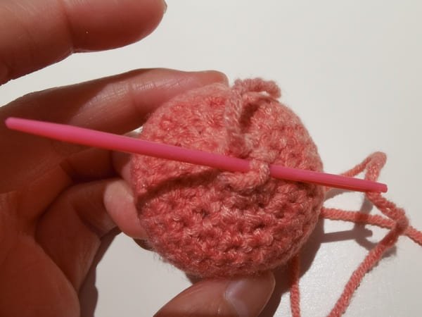 conceal the yarn end with yarn needle
