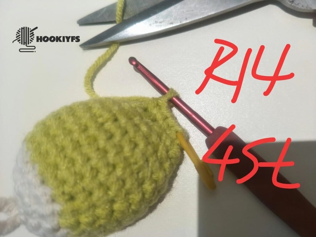 cut yarn end for Round 14 of fish crochet