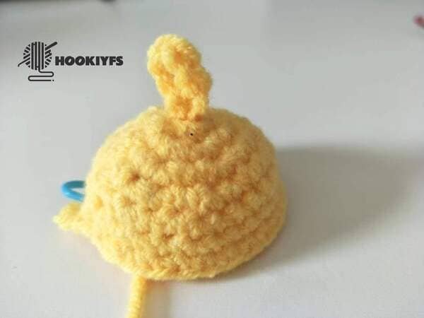 hand carrying sewing on the body for duck crochet
