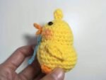 hand with duck crochet kit