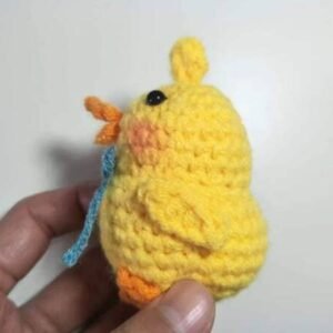 hand with duck crochet kit