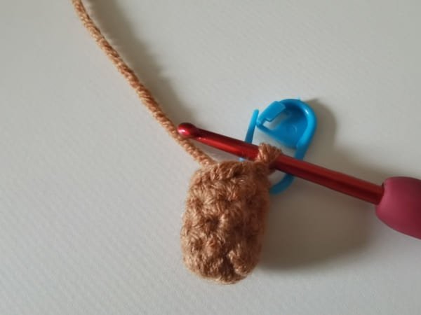 one foot is completed for teddy bear crochet