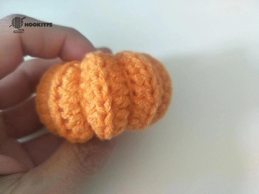 pumpkin on the hand