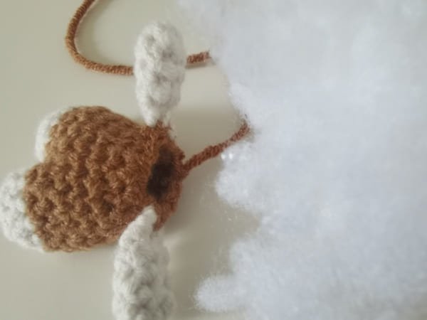 put the fiberfill in to body of hello kitty for body for hello kitty crochet pattern