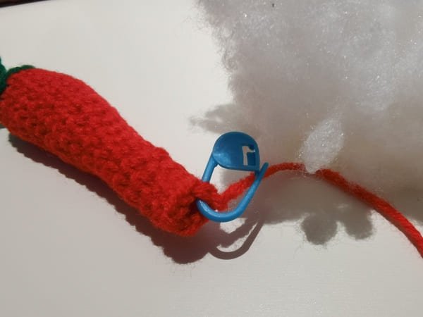put the fiberfill in to the hole of body of chili