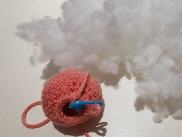 put the fiberfill in to the hole of peach