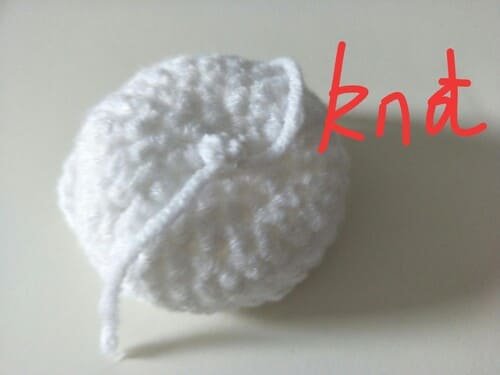 put the hand carrying on the hat and tie knot on the back