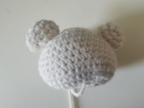 sew the ear on the head of hello kitty