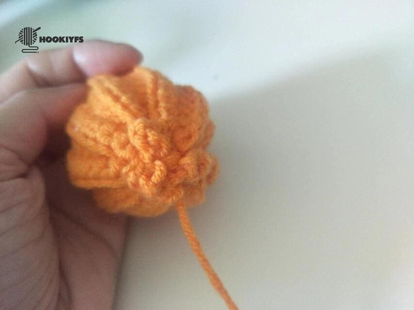 sew the second of one side is completed for crochet pumpkin pattern