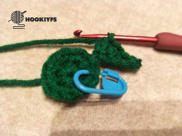 the first small leaf is completed of strawberry crochet