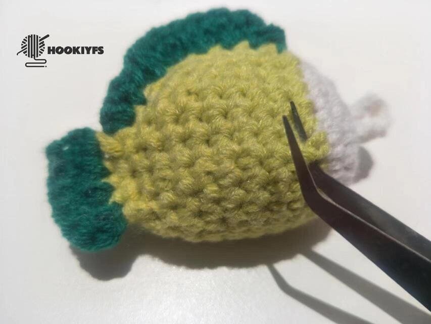 the position where the hook enters the needle for fin