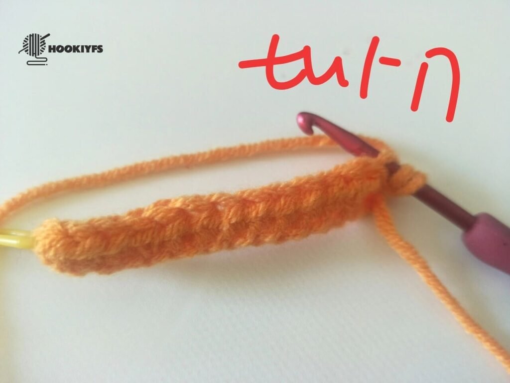 turn the fabric for round 2 for crochet pumpkin pattern