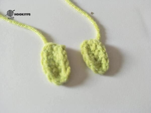 two piece of feet are completed for crochet frog pattern
