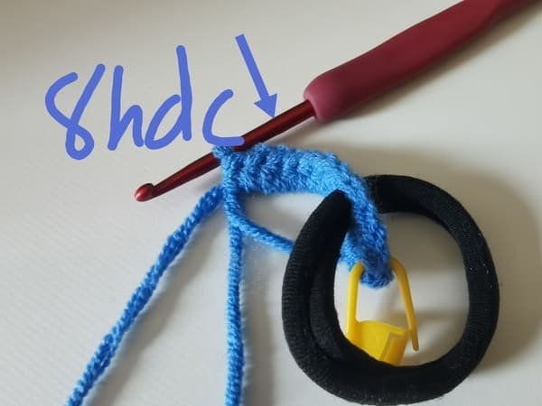 11 half double crochet are completed