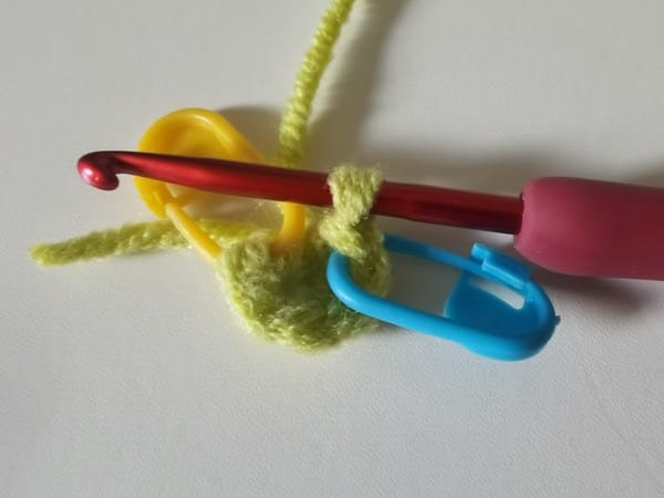 6 single crochets in to magic ring for crochet peas in a pod