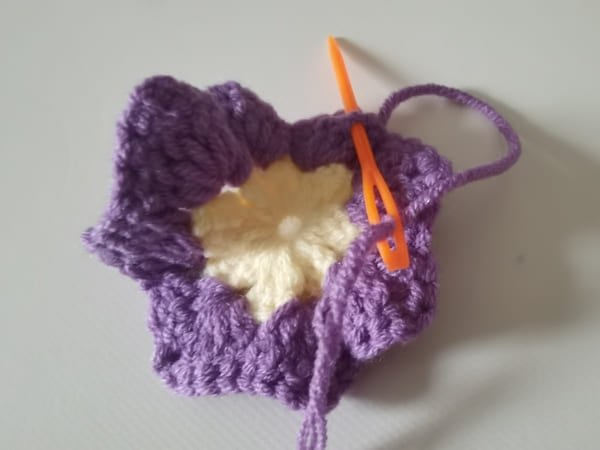 conceal yarn end for round 2 for crochet butterfly pattern