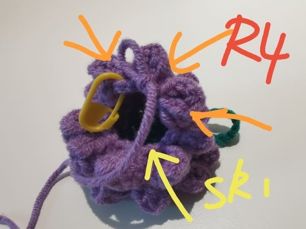 crochet 3 popcorns and skip 1 for round 4.