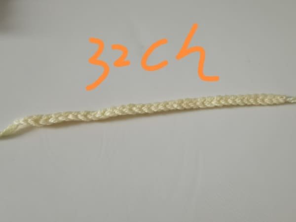 crochet 32 chain stitches for antennae