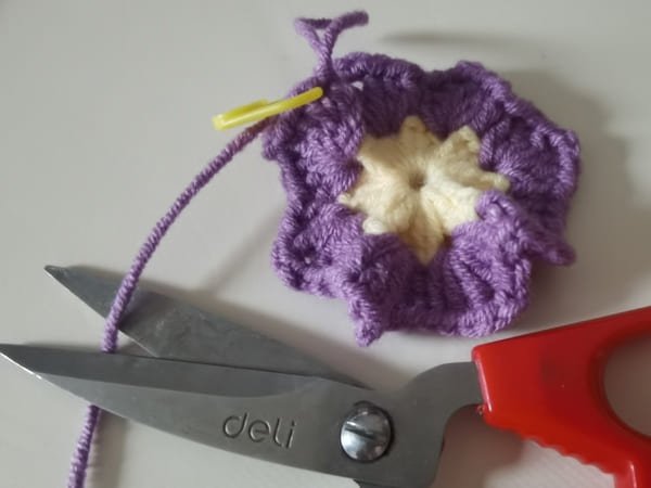 cut yarn end for round 2 for crochet butterfly pattern