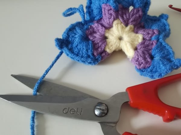 cut yarn end for round 3 for crochet butterfly pattern