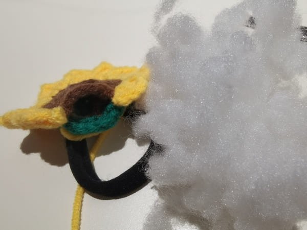 put the fiberfill into the small hole of fabric