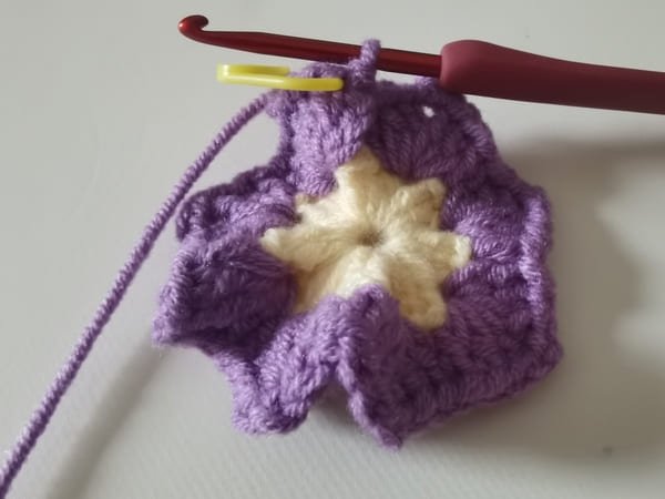 slip stitch is completed for round 2 for crochet butterfly pattern