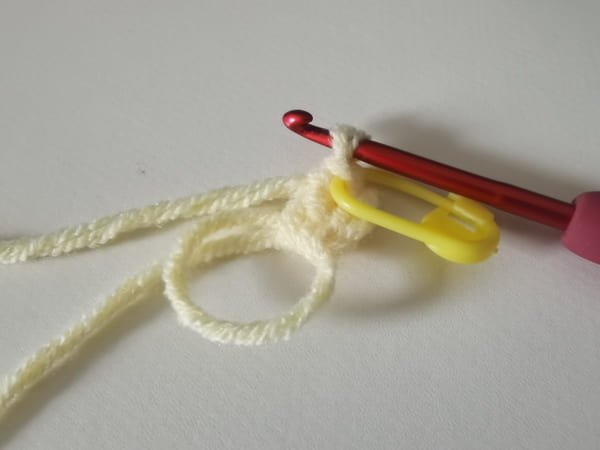 the first double crochet in to magic ring for crochet butterfly pattern
