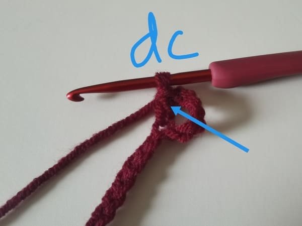 the first double crochet is completed for round 1 for bow crochet