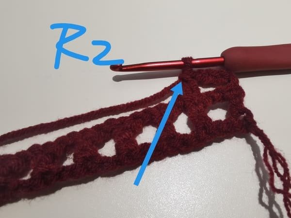 the first double crochet is completed for round 2 for bow crochet