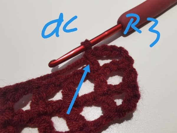 the first double crochet is completed for round 3 for bow crochet