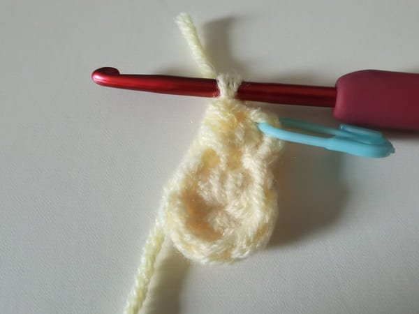 the first half double crochet is completed