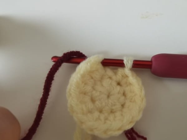 yarn over with wind red yarn for slip stitch