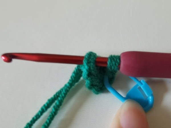 the hook insert the first stitch for slip stitch