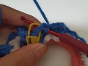 the hook insert the first stitch for slip stitch for round 3