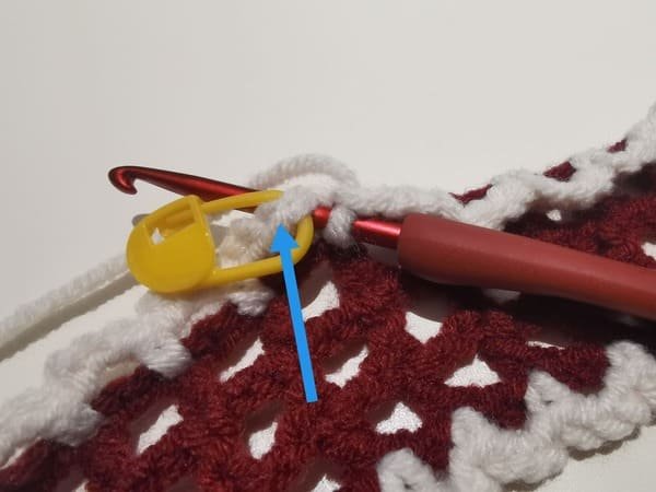 the hook insert the first stitch for slip stitch for round 4 for bow crochet