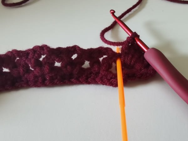 the hook insert the next small holes for round 3 for crochet rose pattern