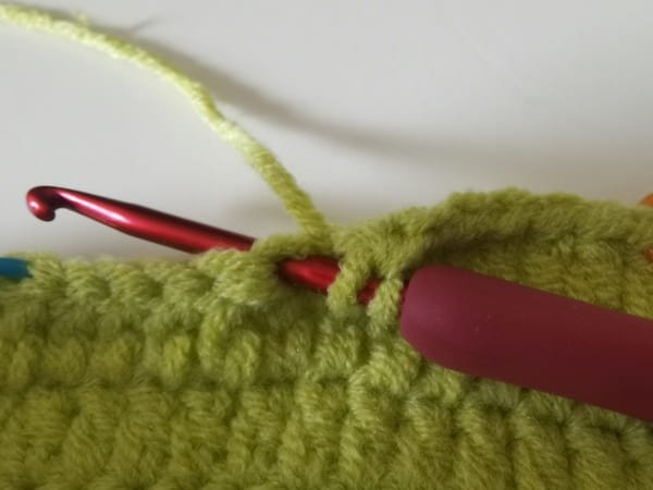 the hook insert the next stitch for double crochet